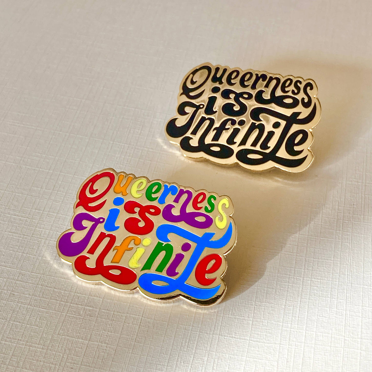 Queerness Is Infinite: Multi-Colored Pin