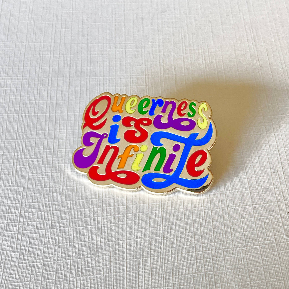 Queerness Is Infinite: Multi-Colored Pin